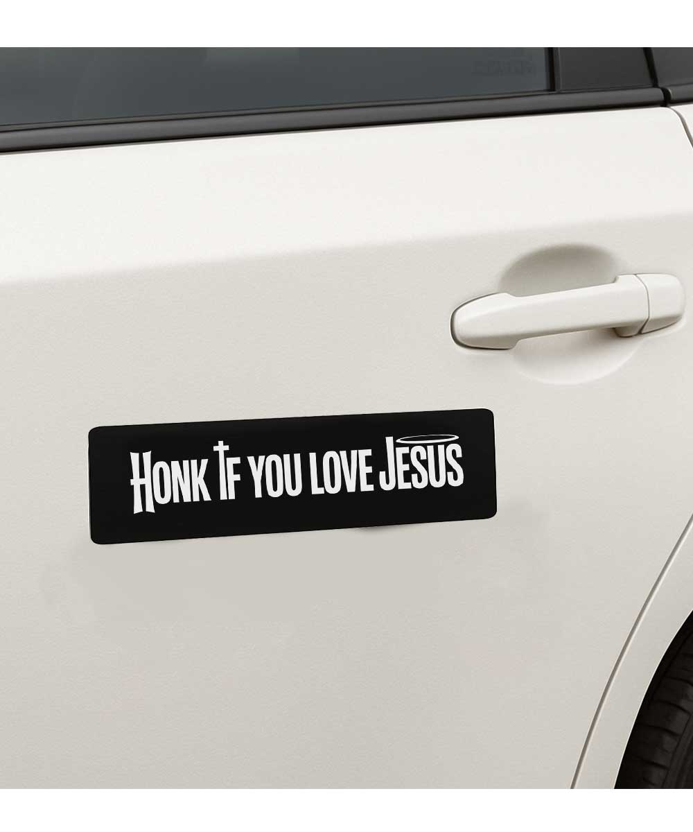 honk-if-you-love-jesus-bumper-sticker-on-car-side-door Honk if you love Jesus bumper sticker displayed on the side door of a white car