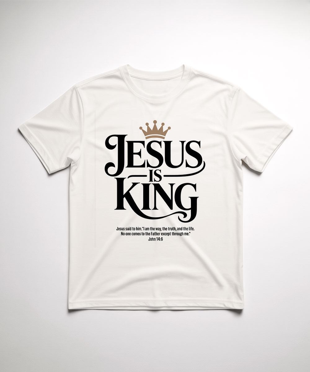 A white "Jesus is King Christian T-Shirt" laid flat, featuring an elegant font with a crown graphic and a Bible verse scripture below.