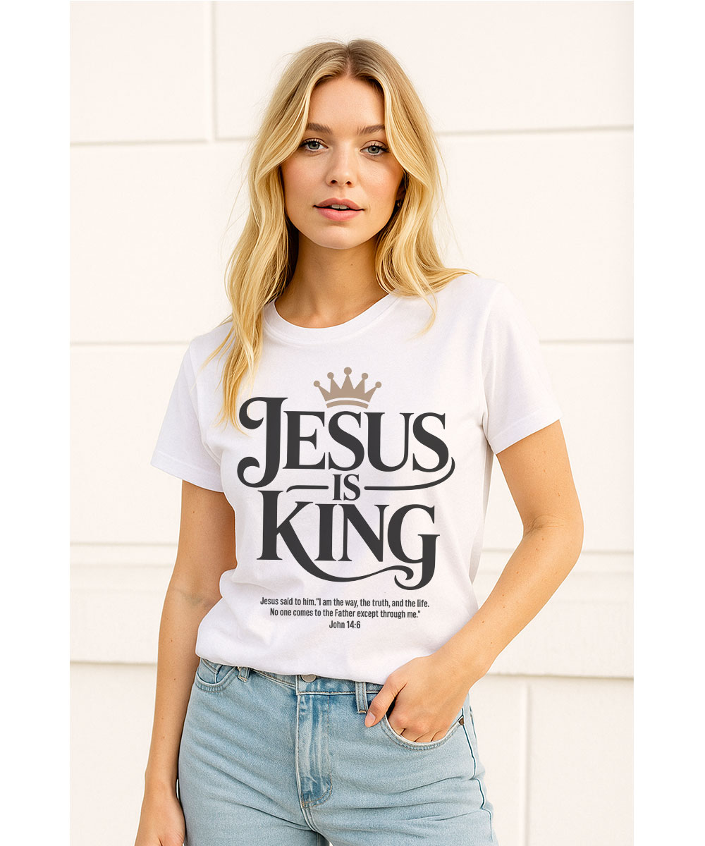 jesus-is-king-christian-t-shirt-woman-model-lifestyle-photo A woman with blonde hair models the white "Jesus is King Christian T-Shirt" with jeans, showing a modern, faithful style.