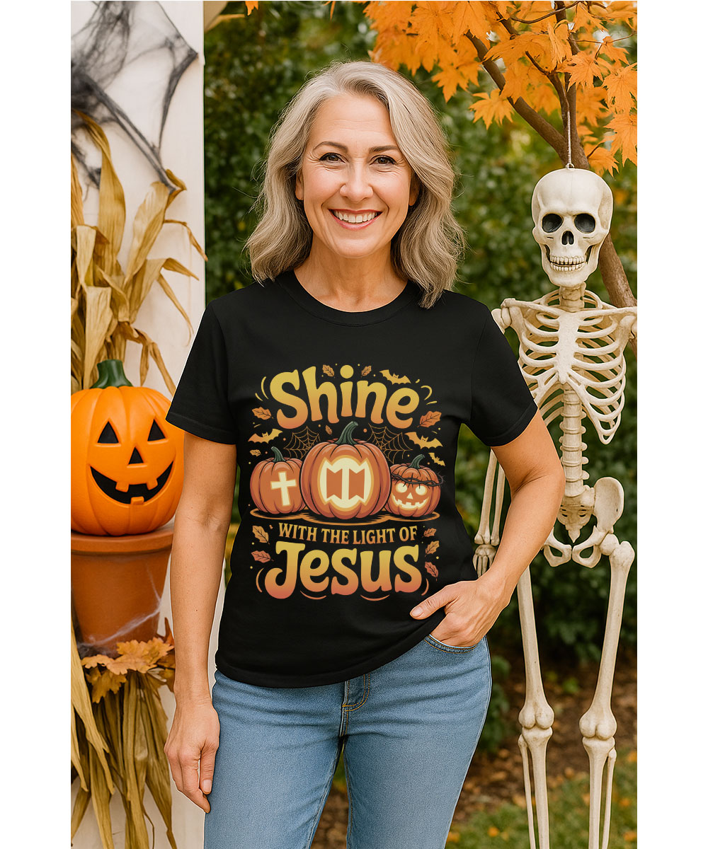 shine-with-the-light-of-jesus-christian-halloween-pumpkin-t-shirt-older-woman-skeleton-prop Older woman in Shine With The Light Of Jesus Christian Halloween Pumpkin T-Shirt standing next to skeleton and pumpkins