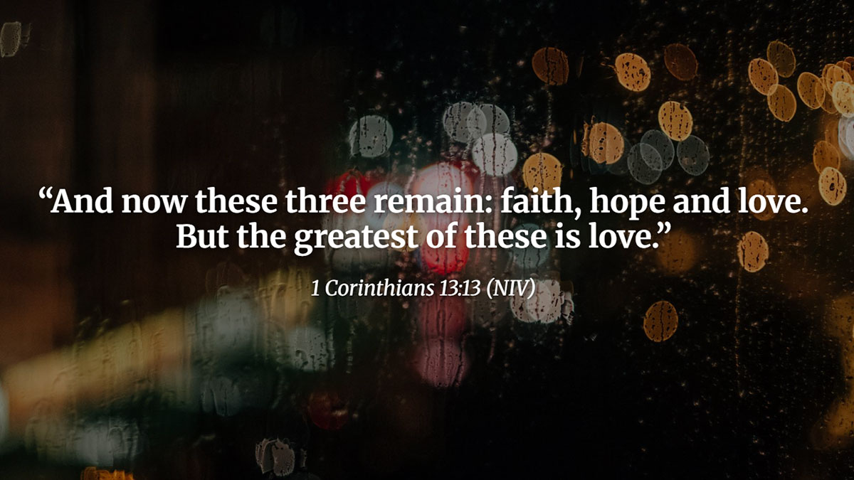 Bible quote image featuring 1 Corinthians 13:13 with the message “faith, hope and love” highlighting the three virtues, with scenic background